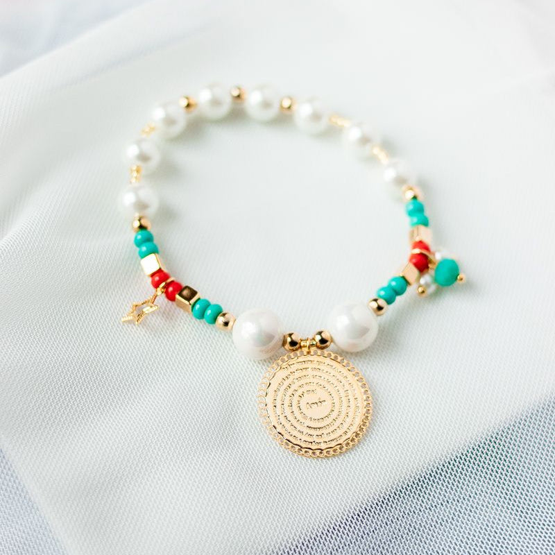 flori_pulsera_padre_nuestro